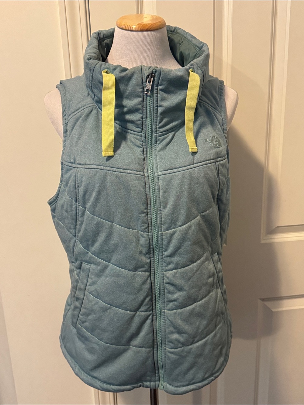 The North Face Teal Quilted Hooded Vest with Yellow Drawcords